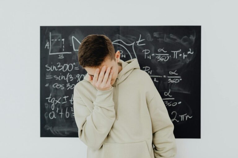 disheartened student against blackboard